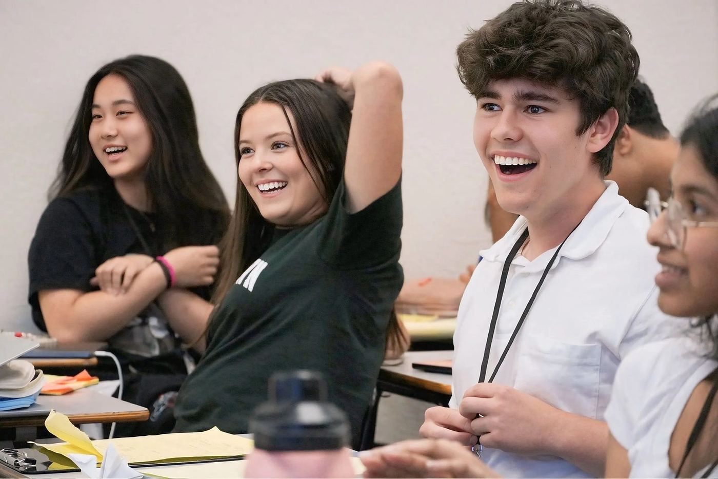 Students laughing together during class